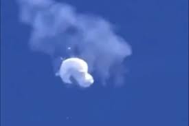 An American fighter aircraft destroys an alleged Chinese surveillance balloon.  teluguvoice