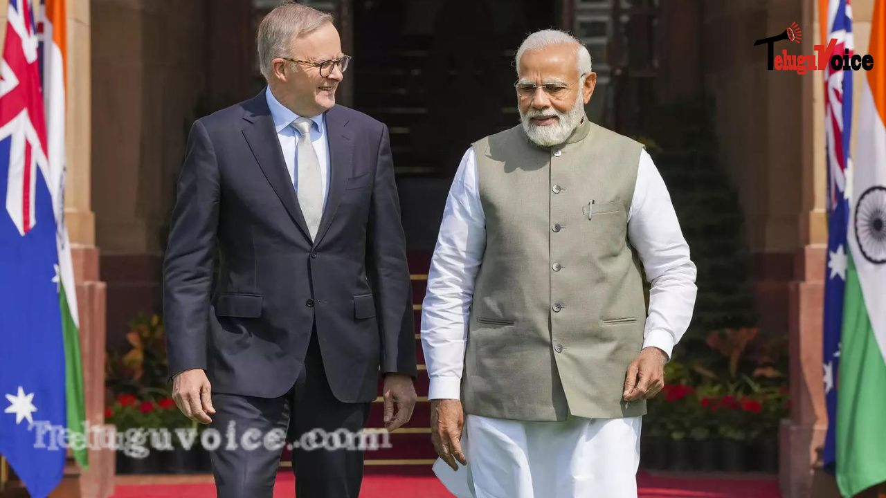 PM Modi discusses temple threats with Australian PM. teluguvoice